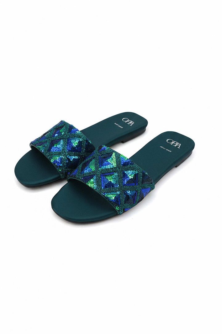 Dark green flats with shimmering sequin upper and satin insole for comfort and style